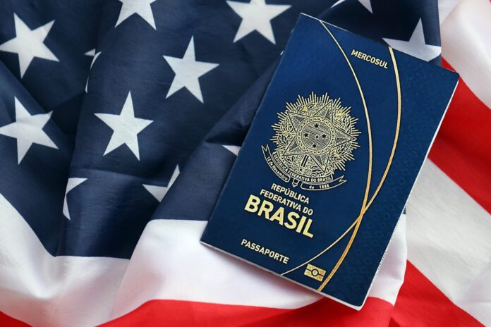 Blue,Brazilian,Passport,On,United,States,National,Flag,Background,Close